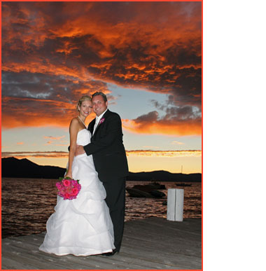 A beach sunset with the newlyweds on the pier