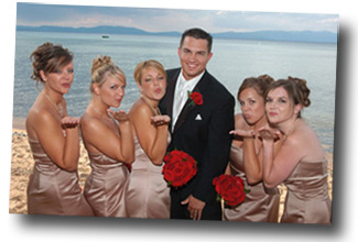 The groom on the beach with the bridesmaids