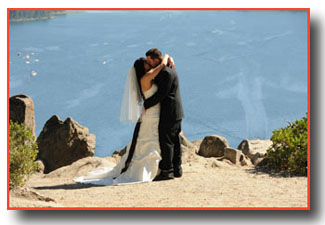 The first kiss of the newlyweds on the bluff of Emerald Bay