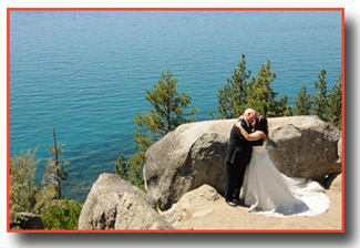 Distant photo of the bride and groom on the overlook of Logan Shoals