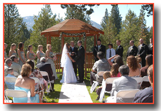 A ceremony being performed at the park gazebo