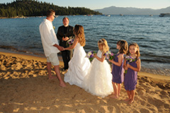 A ceremony being conducted on Zephyr Cove Beach in Tahoe