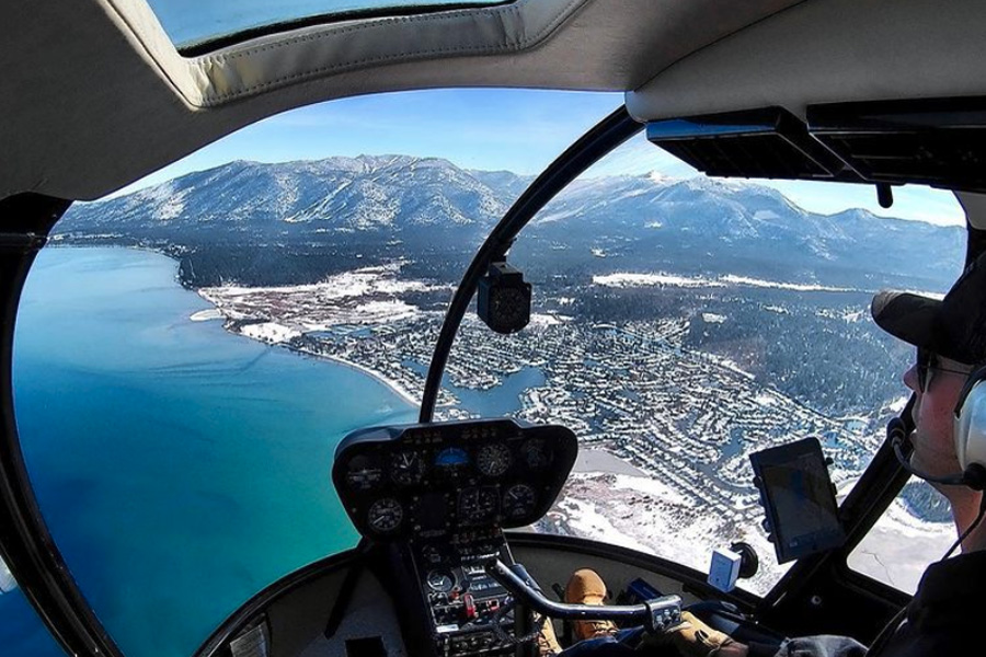 Helicopter cockpit view of Lake Tahoe.