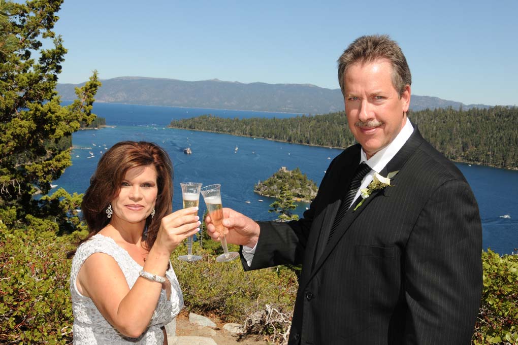 The just married couple have a champagne toast together.