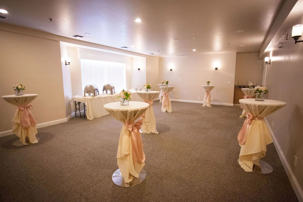 Reception tables nicely decorated in preparation for an event.