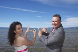 The twosome are using hand signs to communicate.