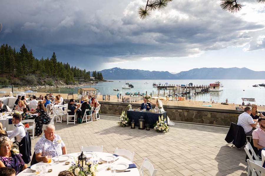 View of the reception deck and bridal table with Lake Tahoe in the background.