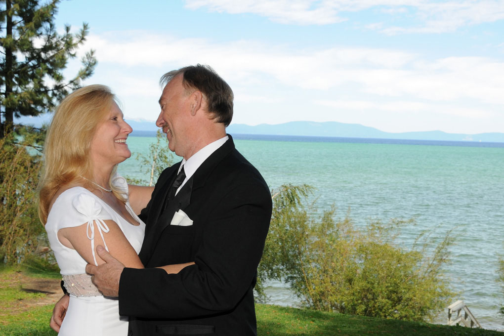 Smiling lovingly at each other after their husband and wife pronouncement.