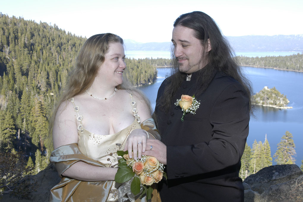 Loving smiles are given between the newlyweds.