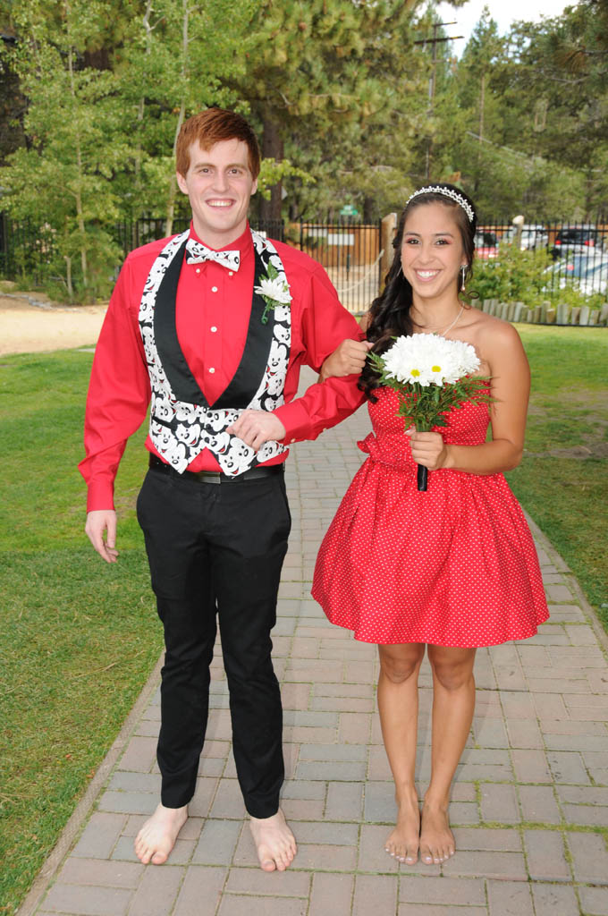 The best man and maid of honor walking down the aisle.