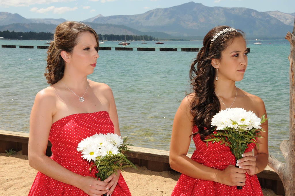 Bridesmaids watching the marriage proceedings intently.