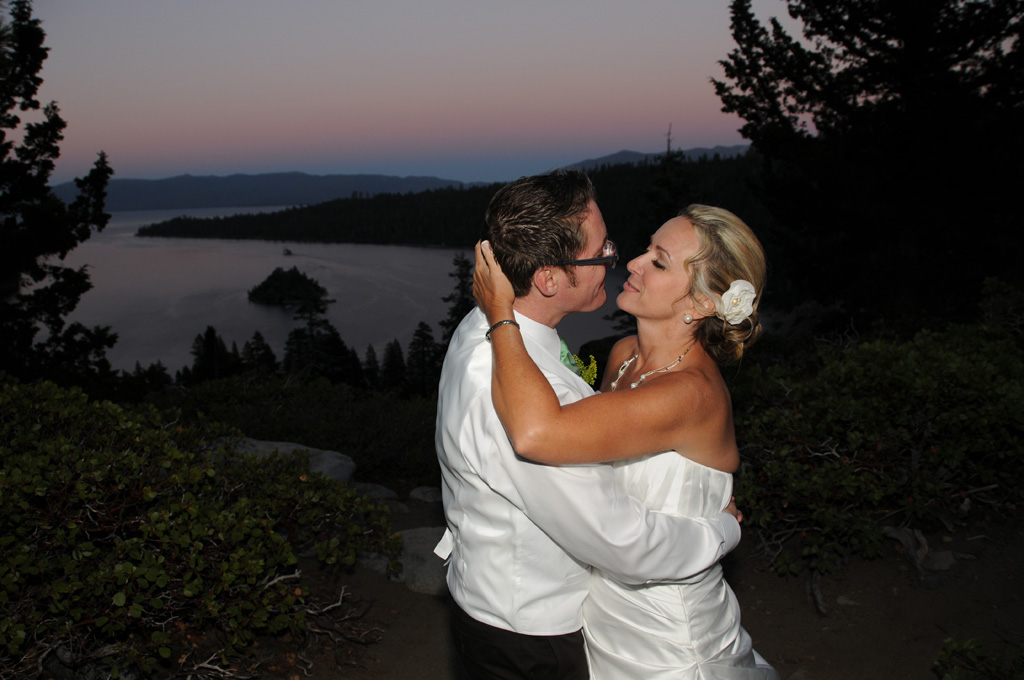 Evening at Emerald Bay and an embracing bride and groom.