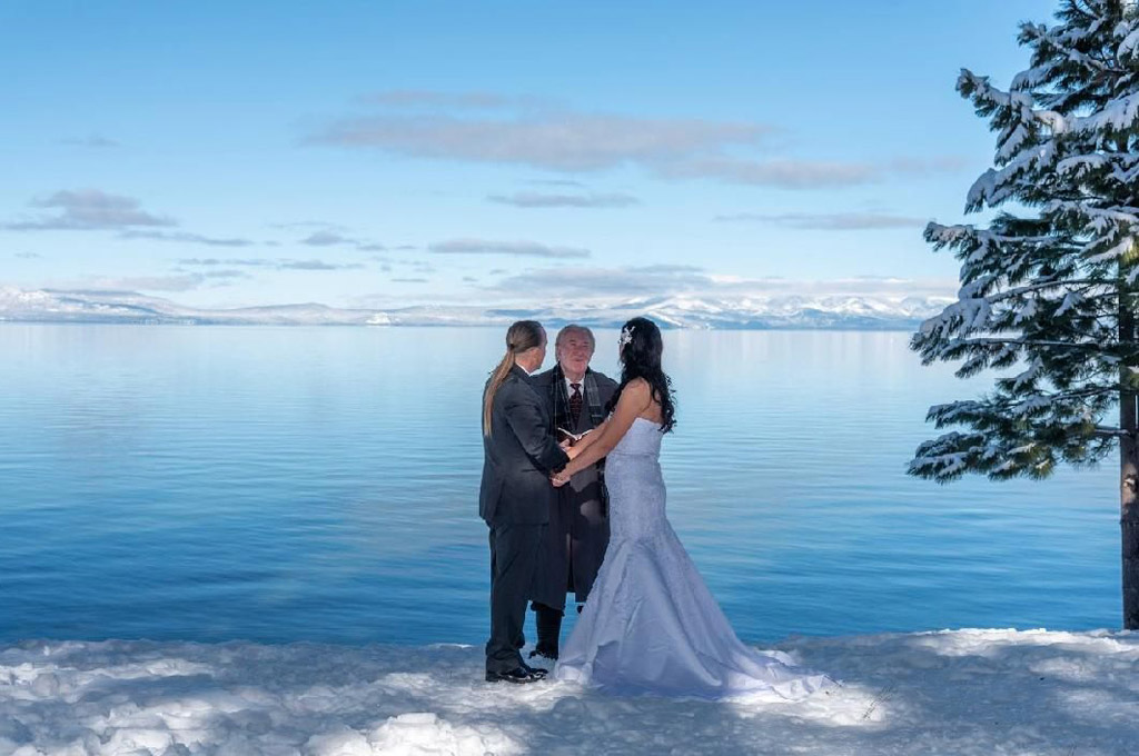 Marriage ceremony in progress with snow on the ground.